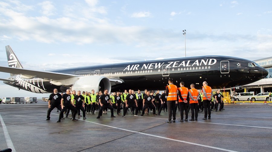 Air NZ staff farewell the All Blacks with mean Haka at Auckland Airport