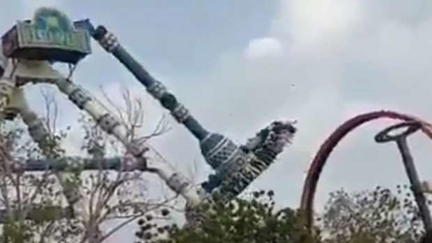 The terrifying moment that an amusement park ride snaps in half