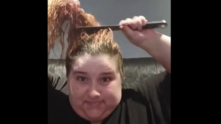 Woman cuts her own hair off with a kitchen knife during lockdown